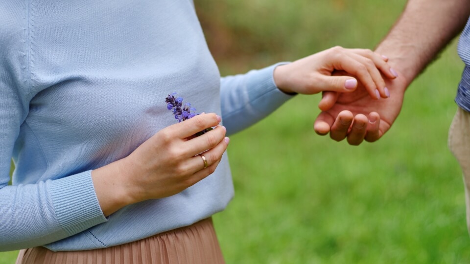 Couple holding hands